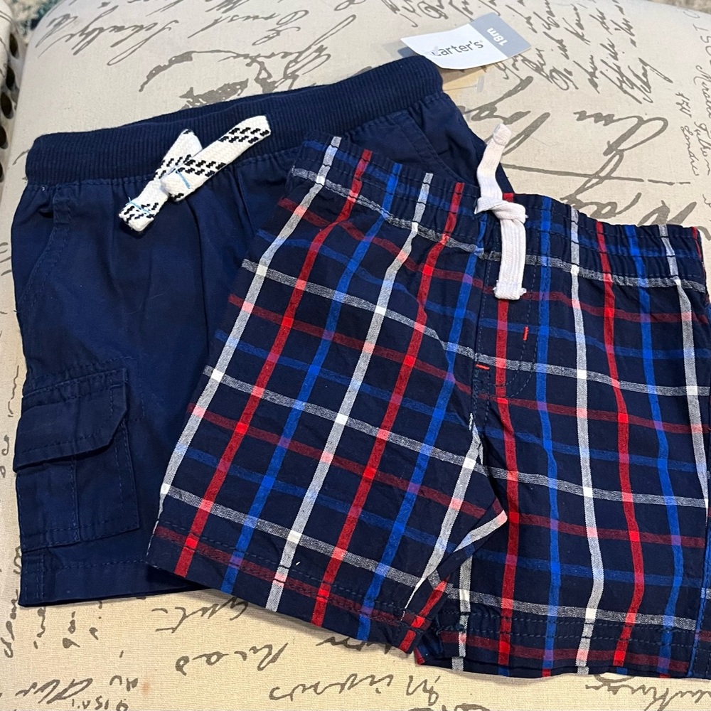 BOY’S Carter’s size 12 and 18 month shorts. The 18 months NWT